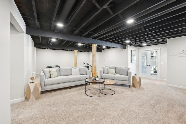 living room with carpet floors and french doors