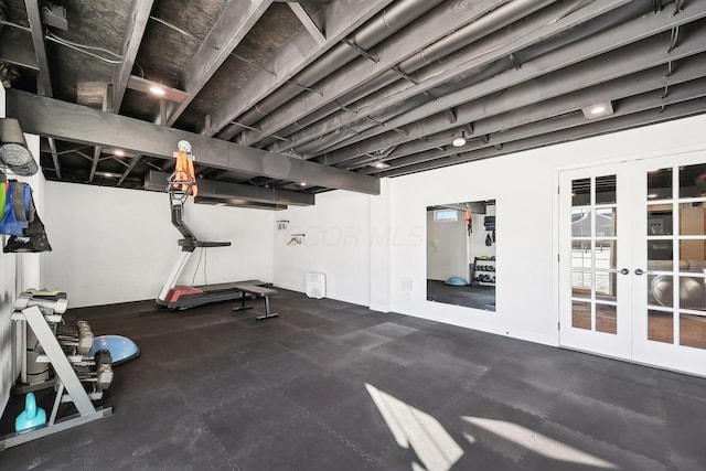 workout room featuring french doors