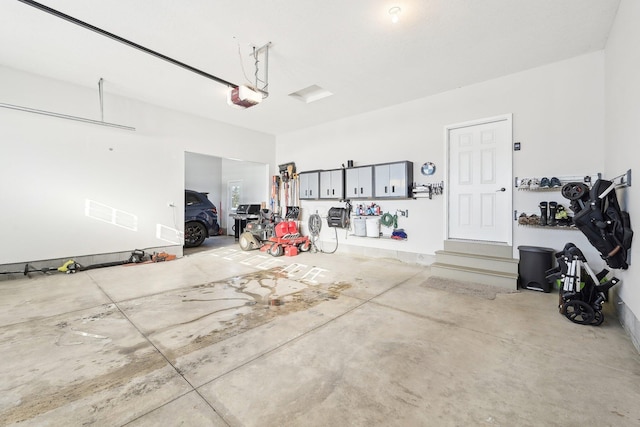 garage featuring a garage door opener