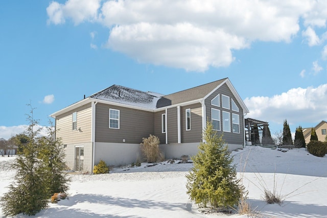 view of snow covered property