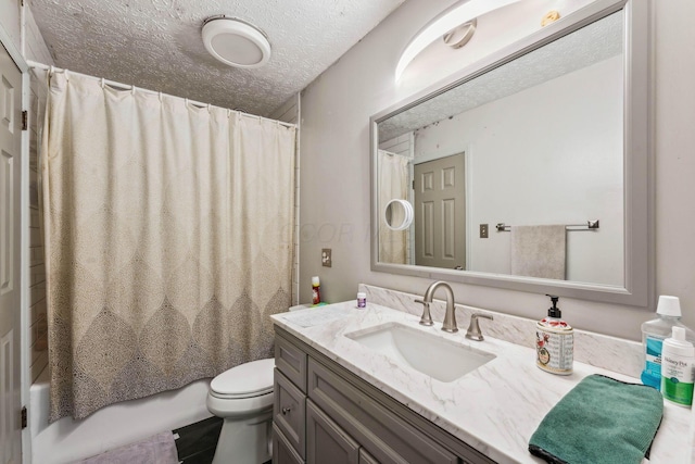 full bathroom featuring a textured ceiling, toilet, vanity, and shower / tub combo with curtain