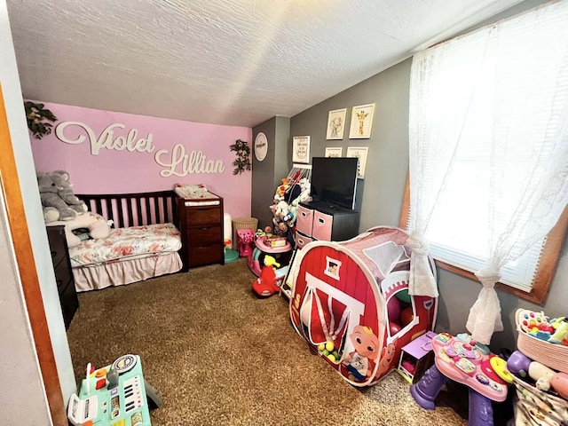 carpeted bedroom with a textured ceiling