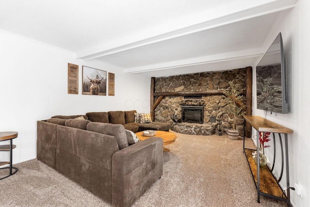 living room with beamed ceiling, ornamental molding, a fireplace, and carpet