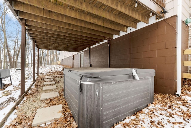 exterior details featuring a jacuzzi