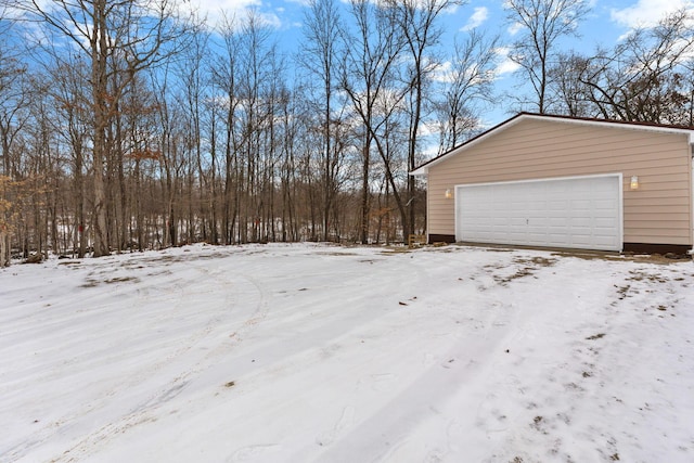 view of snow covered garage