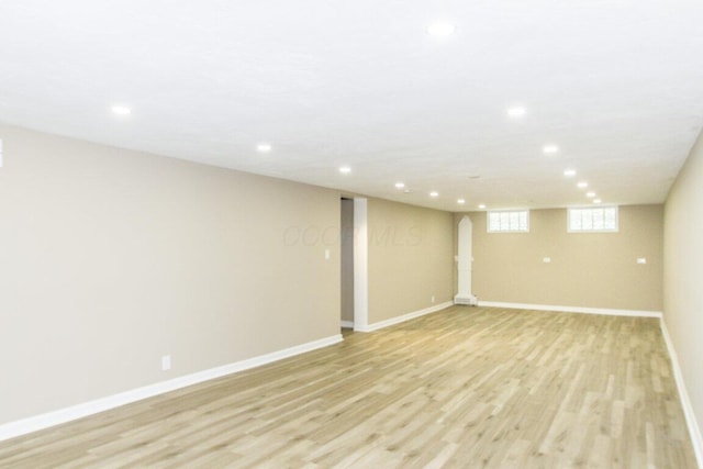 basement featuring light wood-type flooring