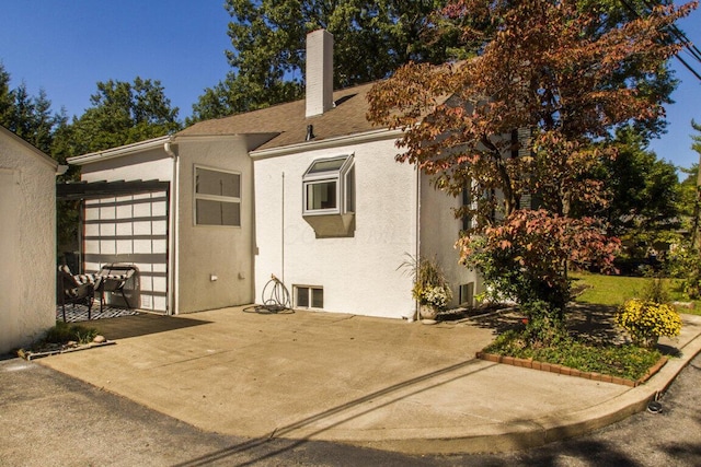 property entrance with a garage