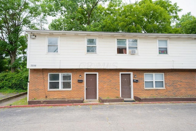 view of front of property featuring cooling unit