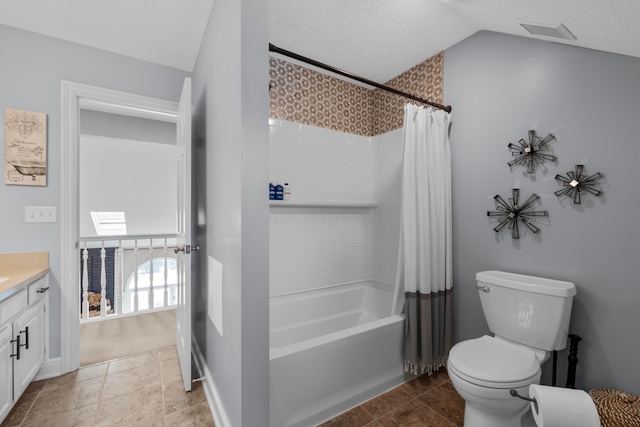 full bathroom with lofted ceiling, vanity, toilet, shower / bath combo, and tile patterned floors