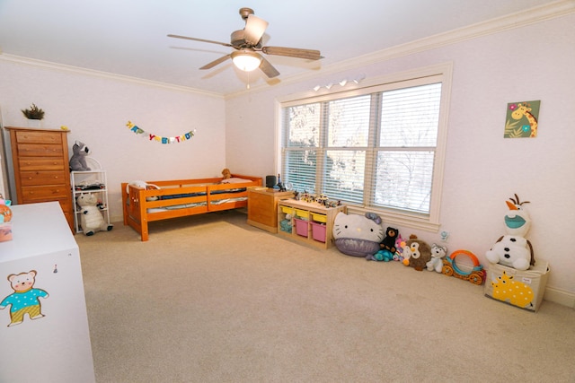 carpeted bedroom featuring ceiling fan and ornamental molding