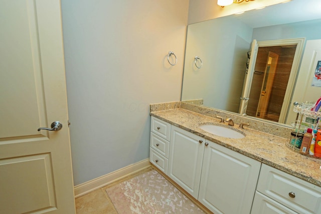 bathroom featuring vanity and tile patterned flooring