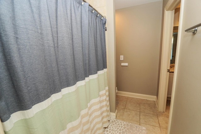 bathroom with tile patterned flooring