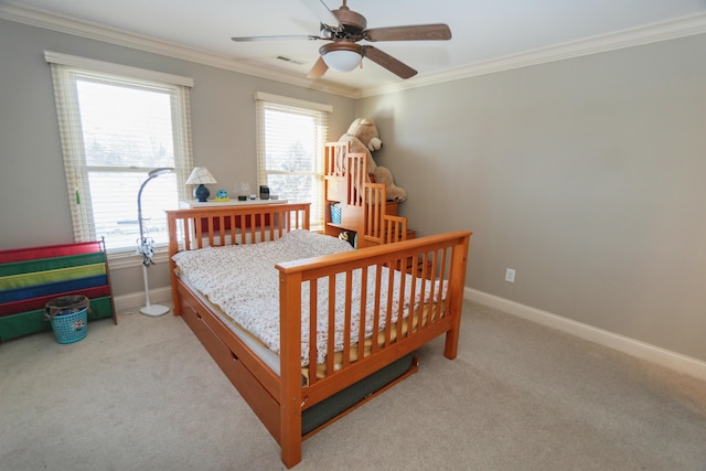 bedroom with ceiling fan, light colored carpet, and ornamental molding