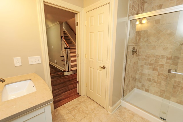 bathroom with vanity and an enclosed shower