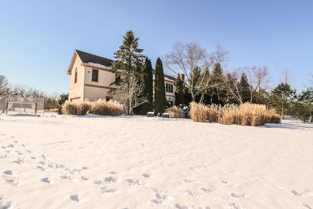 view of snowy yard