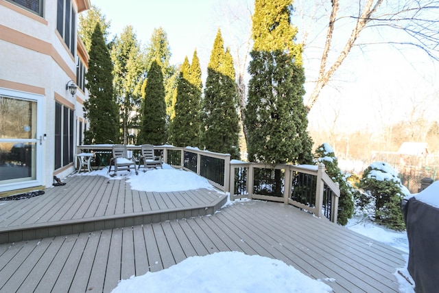 view of snow covered deck