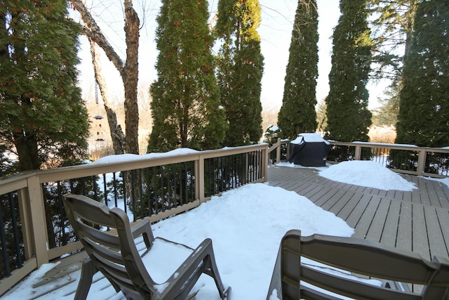 view of snow covered deck