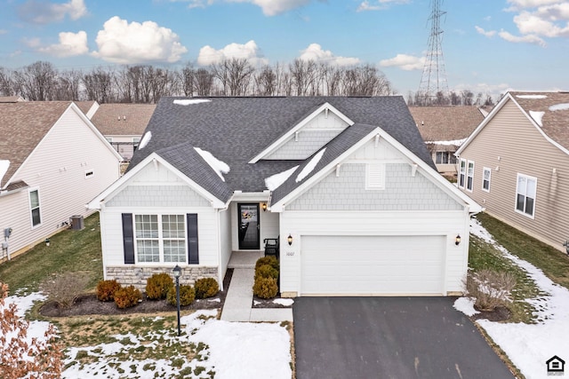 craftsman-style home with a garage