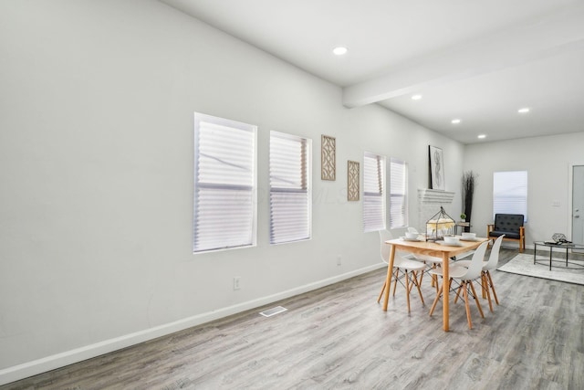 dining area with light hardwood / wood-style floors