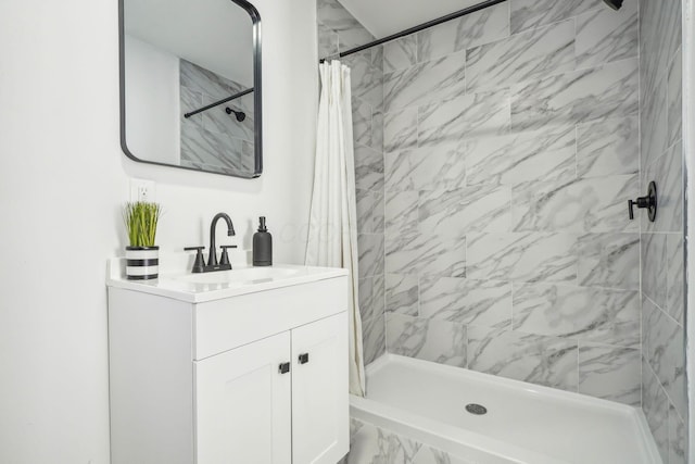 bathroom featuring vanity and a shower with curtain