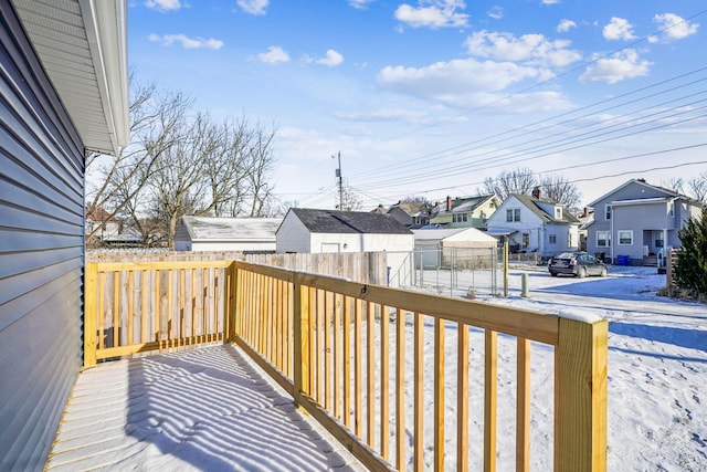 view of snow covered deck