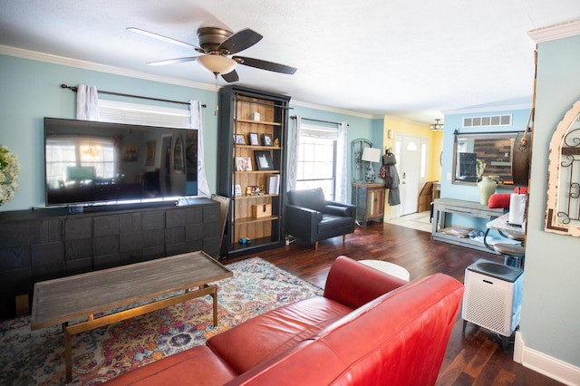 living room featuring ceiling fan, dark hardwood / wood-style flooring, and ornamental molding