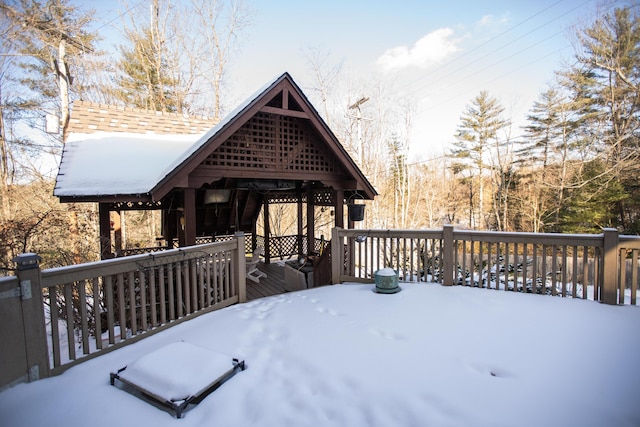 view of snow covered deck