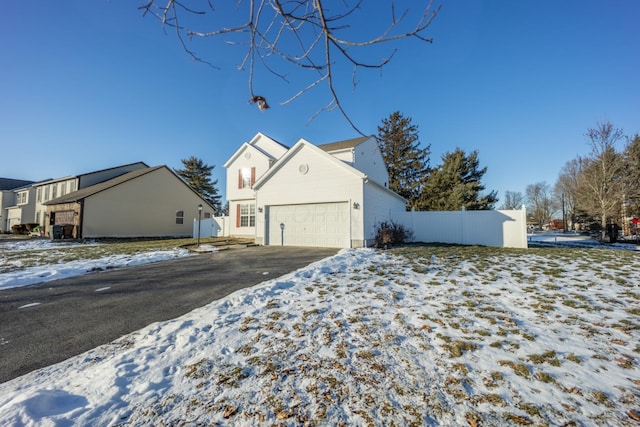 exterior space with a garage