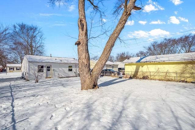 view of snow covered house