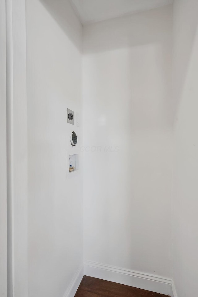 laundry area featuring dark hardwood / wood-style floors, hookup for a washing machine, and hookup for an electric dryer