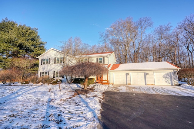 front of property with a garage