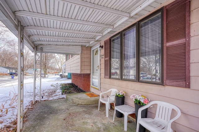 view of snow covered patio