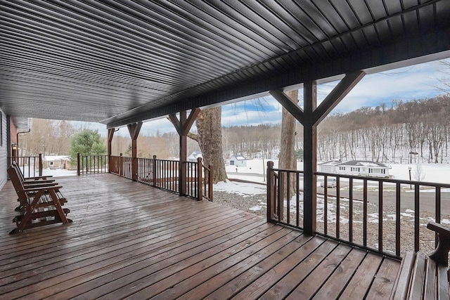 view of snow covered deck