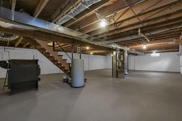 basement with heating unit and gas water heater