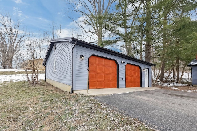 view of snow covered garage