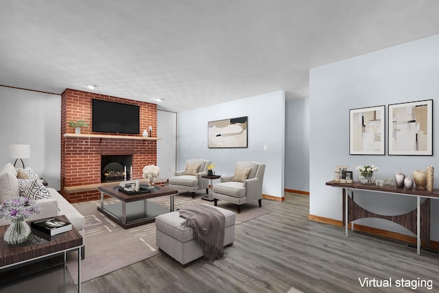 living room with hardwood / wood-style flooring and a fireplace