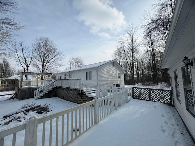 view of snow covered deck