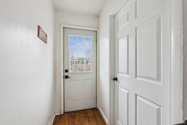 doorway to outside with dark hardwood / wood-style flooring