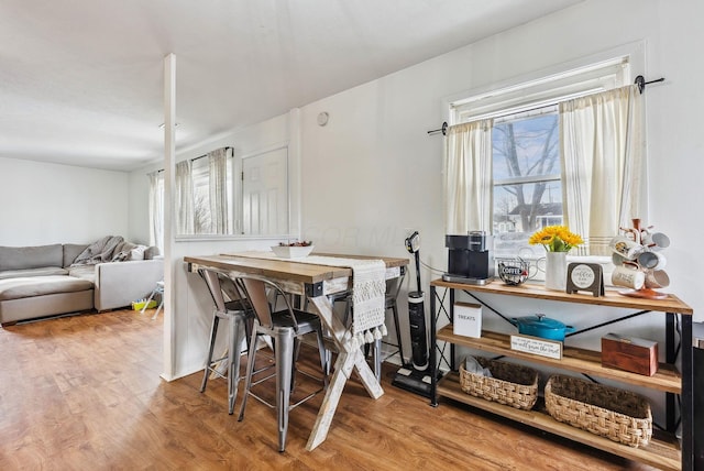 dining area featuring wood-type flooring