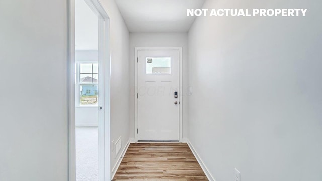 doorway featuring light hardwood / wood-style flooring