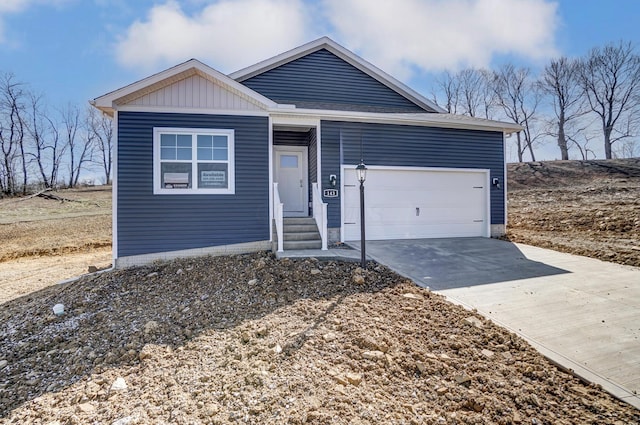 ranch-style home with board and batten siding, a garage, and driveway