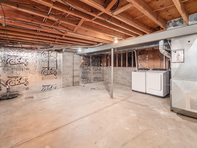 basement featuring washing machine and dryer