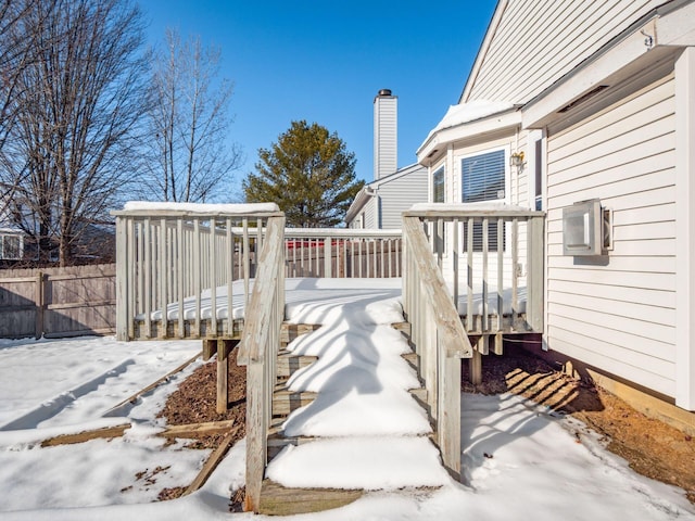 view of snow covered deck