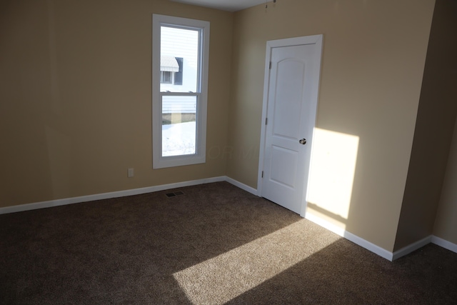 view of carpeted spare room