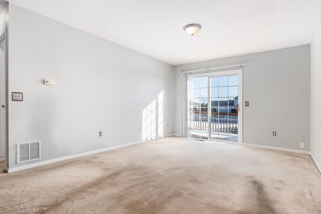 view of carpeted spare room