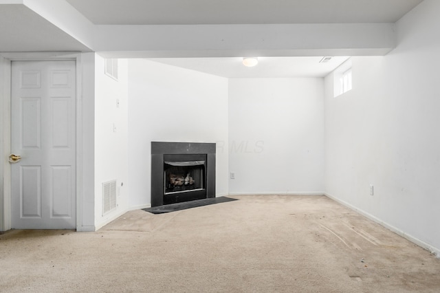 basement with light colored carpet