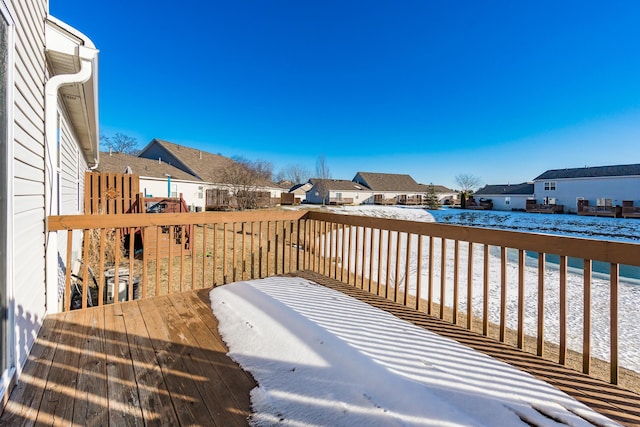 view of snow covered deck