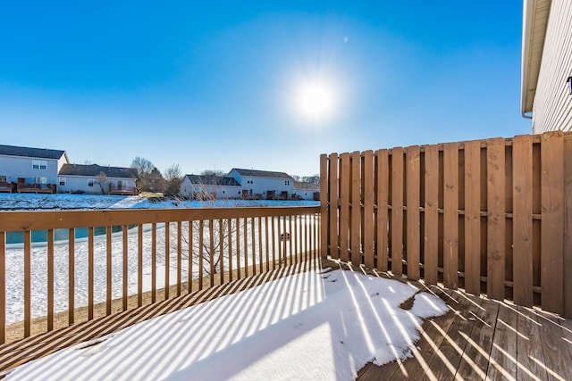 view of snow covered deck