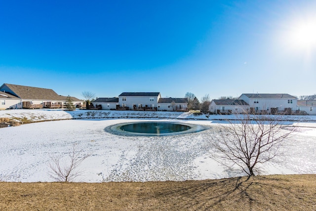 view of snow covered pool