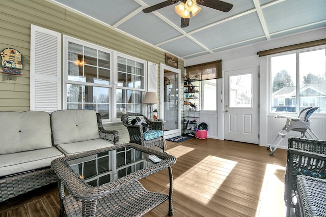 sunroom featuring coffered ceiling and ceiling fan